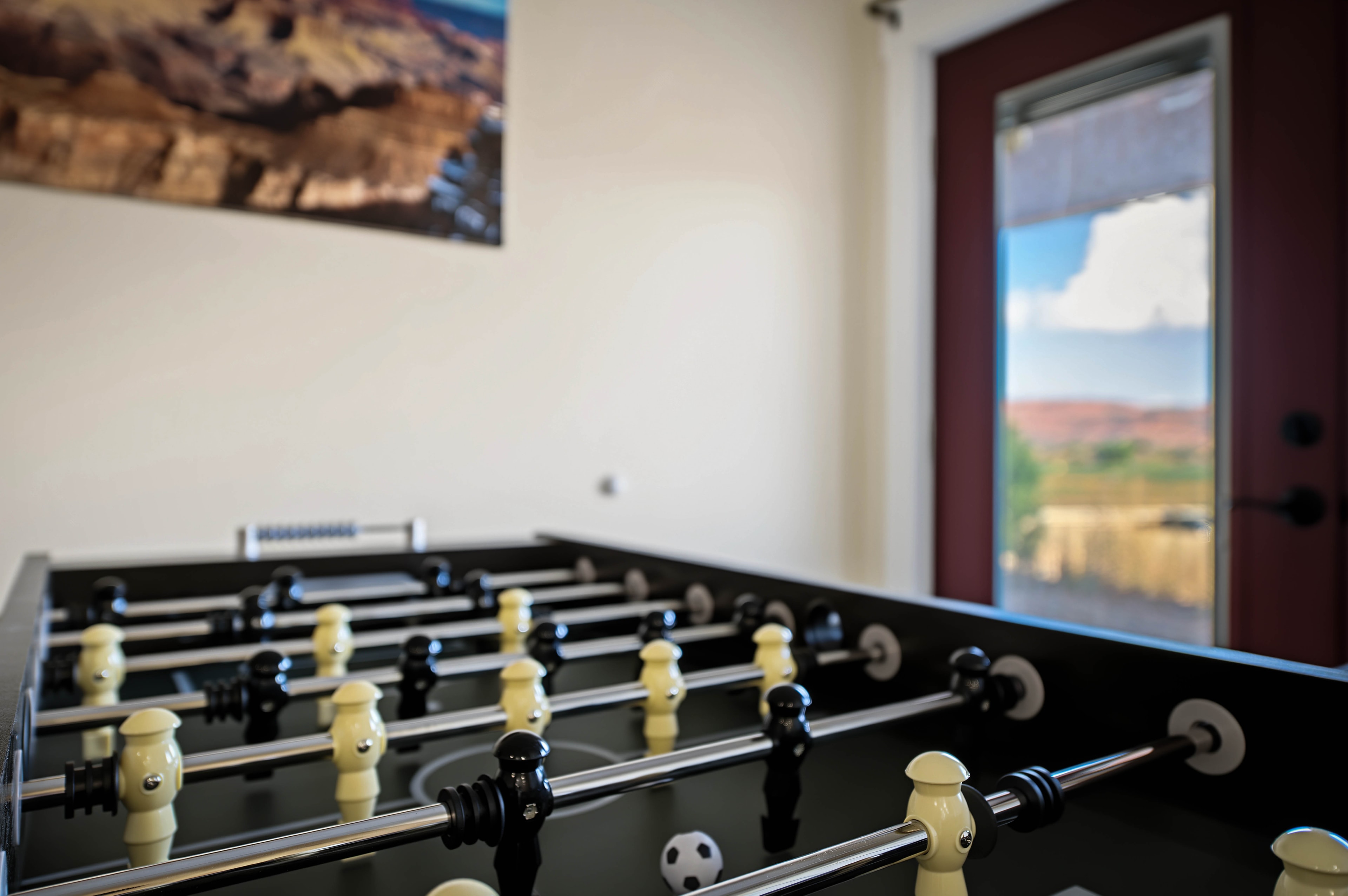 Indoor game room with foosball table — Kanab vacation rental amenities