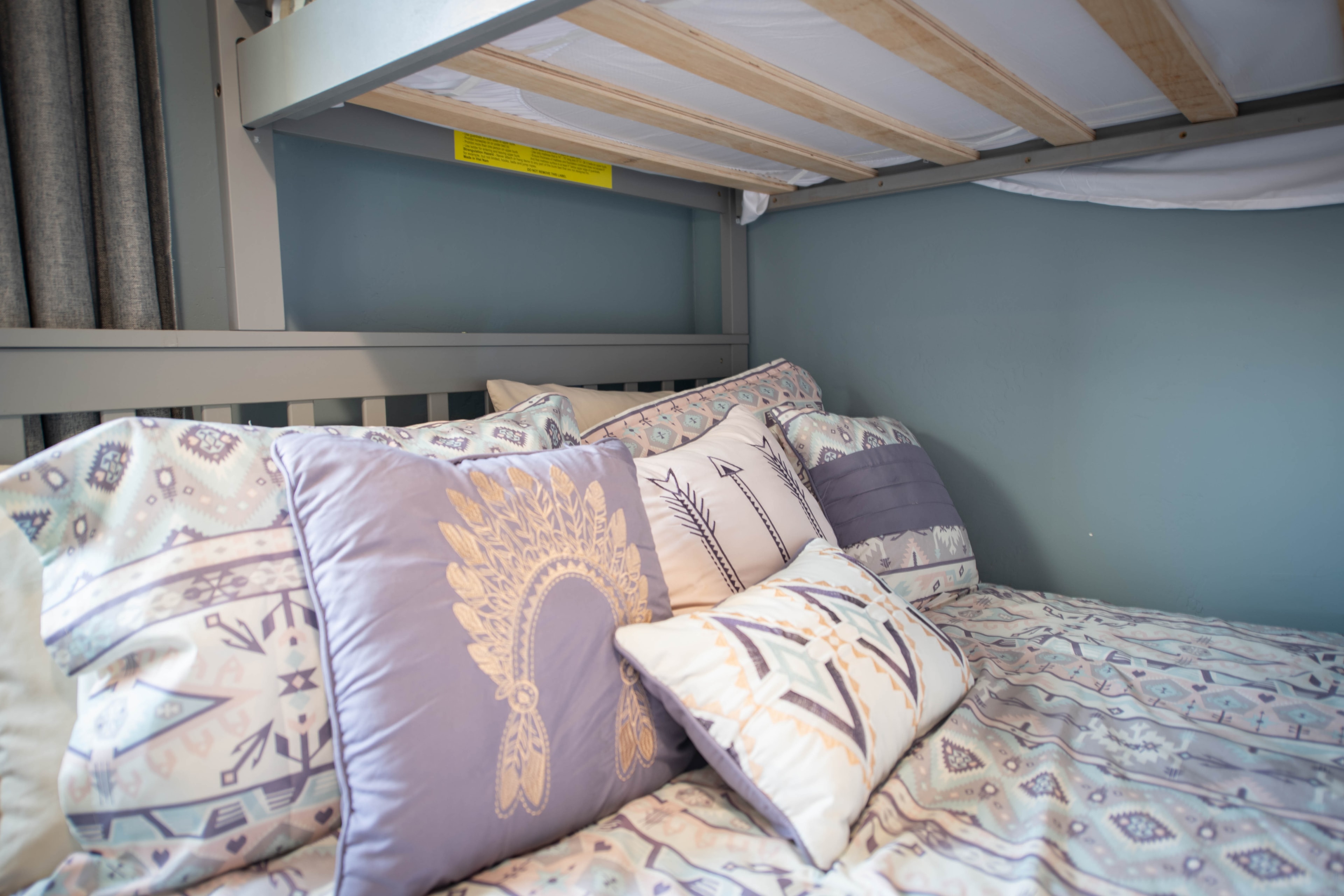 Bunk bed with southwestern patterned bedding — Kanab vacation rental bunkroom
